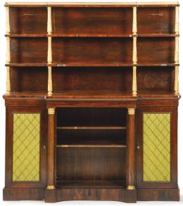 Lote 1267: Librería Regencia en madera de palisandro, con montantes en madera dorada y aplicaciones de bronce. Inglaterra, primer tercio S. XIX