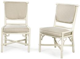 Lote 1479
Pareja de sillas de comedor en madera de bambú pintadas color blanco con asiento y respaldo tapizado. S.XX