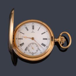 Lote 2535
OMEGA, reloj saboneta con caja en oro rosa de 18 K.