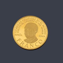 Lote 2597
Moneda conmemorativa políticos en el mundo "Franco" en oro de 21 K.