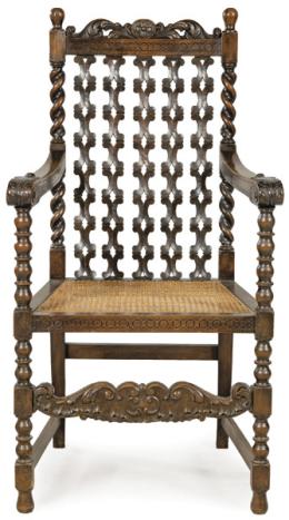 Lote 1217
Silla con brazos estilo Carlos II siguiendo modelos anglo-holandeses de la segunda mitad del S. XVII en madera de nogal tallada, calada y torneada, con asiento de rejilla. Finales S. XIX