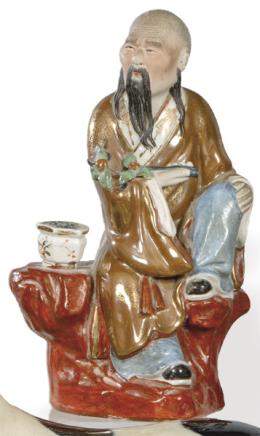 Lote 1346
"Han Xiangzi" incensario de porcelana china parte en biscuit policromado y el resto vidriado, China pp. S. XX.