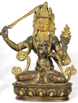 Lote 1395
"Tara Sentada"  en bronce dorado, patinado y policromado Tibet S. XIX.