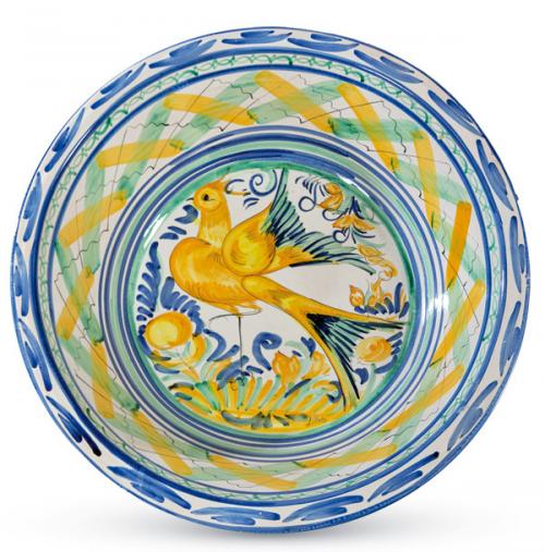  Lebrillo en cerámica pintada a mano y esmaltada de Triana, campo con figura de ave.
Sevilla, S. XX