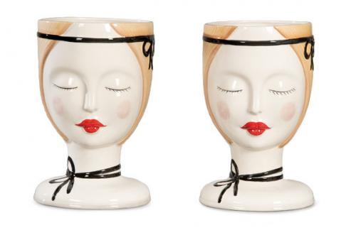  Pareja de maceteros en forma cabezas de mujer en cerámica pintada y esmaltada de Bassano, con sello en la base de Artistic Design.
Italia, Venecia