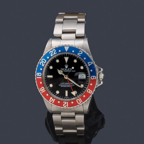 Lote 2648
ROLEX mod. Oyster Perpetual "GMT Master" Superlative Chronometer Officially Certified. Ref. 16750. Reloj para caballero con caja y brazalete en acero. 