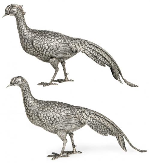 Lote 1178
Pareja de pavos reales de plata española punzonada 1ª Ley.