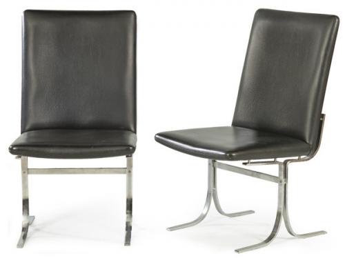 Lote 1344
Pareja de sillas de Dyrlund, con estructura de acero cromado y tapicería de cuero negro. 
Dinamarca, años 60