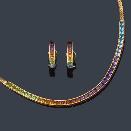  H. STERN
Collar y pendientes tipo criolla con peridotos, citrinos, amatistas y topacios azules en degradado de color.