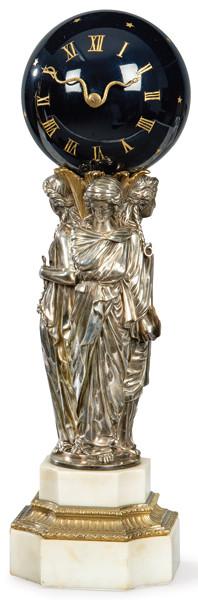 Lote 1543
Reloj de sobremesa estilo Luis XVI, maquinaria firmada por E. Vittoz, con figuras en bronce plateado una representa las artes de la pintura, otra la arquitectura y otra la industria.