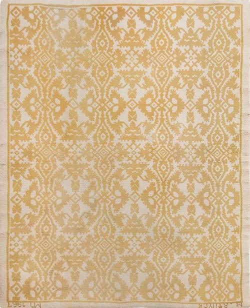  Alfombra española tipo Cuenca en lana de Miguel Stuyck firmada y fechada en 1967.