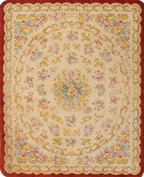  Alfombra española en lana años 50-60.
Campo beis con medallón circular que encierra flores dispersas y flores concentradas en las esquinas.