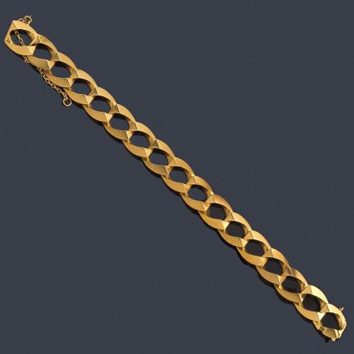  Pulsera con eslabones articulados en oro amarillo de 18K.