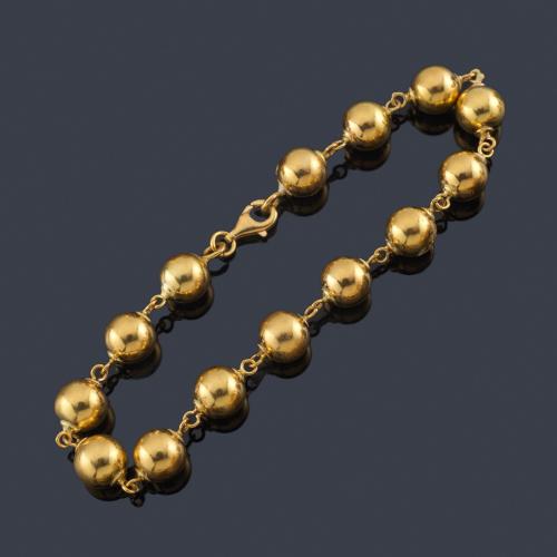  Pulsera con cuentas esféricas de oro amarillo de 18K.