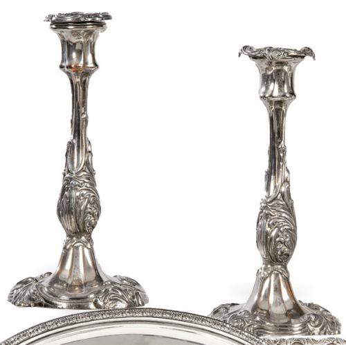  Pareja de candeleros de metal plateado S. XIX.