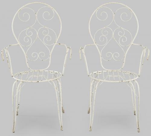  Pareja de butacas de jardín en hierro curvado y pintado de blanco.
S. XX