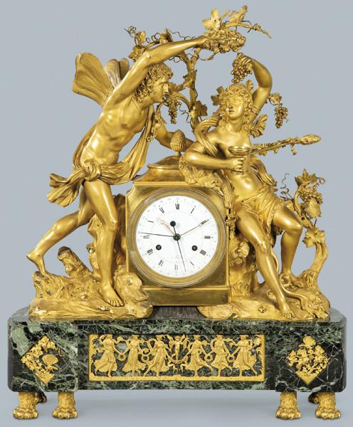  Thomire Le Jeune (1751-1843)
Reloj de sobremesa estilo imperio en bronce cincelado y dorado sobre base de mármol verde representando a “Zephir et Erigone”. 