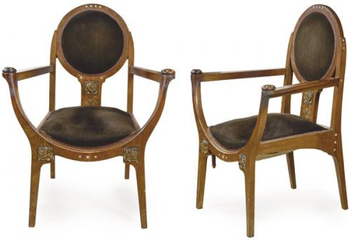 Pareja de butacas art nouveau en madera de caoba, con decoración embutida de nacar y aplicaciones de latón.
Francia, principios S. XX