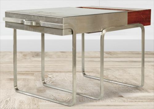  Susana Solano (1946)
Mesa modelo Valigia  1988-89, con estructura en acero satinado y caoba
Edición Meta Memphis, Pregnana Milanese, Milán