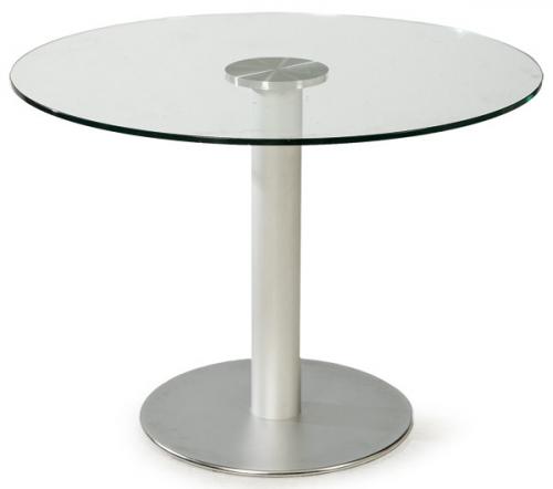 Jesus Gasca, 1994 para STUA
Mesa de comedor modelo Zero con tapa de vidrio transparente redonda, sobre una columna central en acero inoxidable y base de acero.