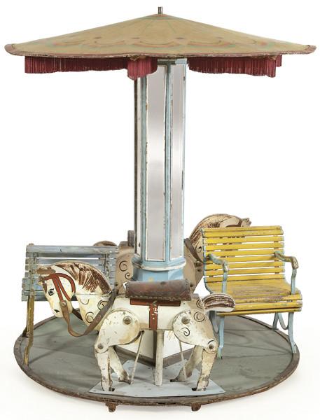  Tiovivo infantil de metal y madera pintada h. 1960-70.