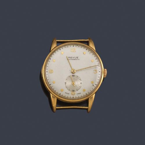  REVUE de caballero con caja en oro amarillo de 18 K.