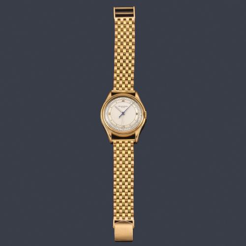  PATEK PHILIPPE de caballero con caja y brazalete (no originales) en oro amarillo de 18 K.