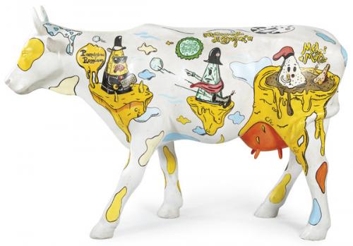  Vaca para Cow Parade de firbra de vidrio decorada con temas de queso firmada por Donald Koeman con la marca "Art in the City" y "javigraica.net".