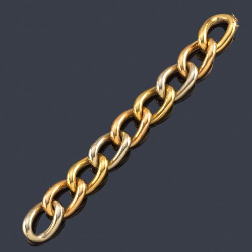  Pulsera con grandes eslabones ovalados en oro blanco y amarillo de 18K.