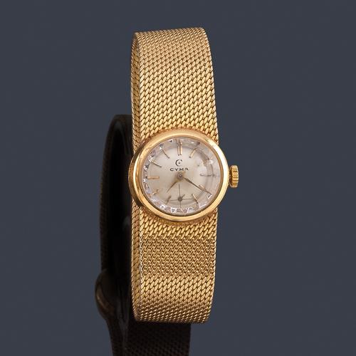  CYMA de señora con caja y brazalete en oro amarillo de 18 K.