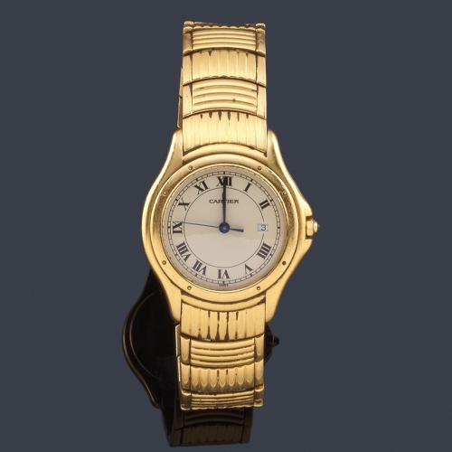  CARTIER Cougar ref. 1165 1 de caballero con caja y brazalete en oro amarillo de 18 K.