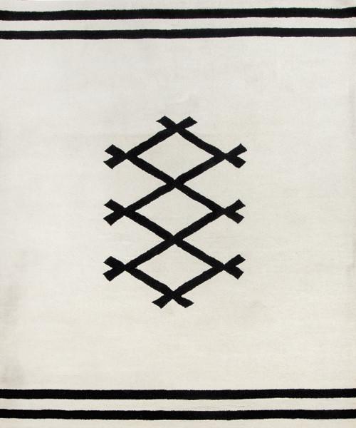 Lote 1529
Alfombra española en lana.
Con diseño geométrico de campo blanco con motivos en negro