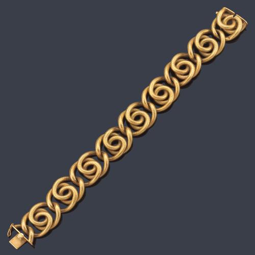  Pulsera con motivos circulares unidos entre sí en oro amarillo mateado de 18K.