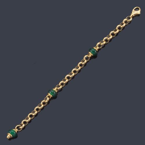  Pulsera con tres gemas de color en montura de oro amarillo de 18K.