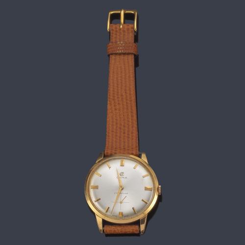  CYMA de caballero con caja en oro amarillo de 18 K.