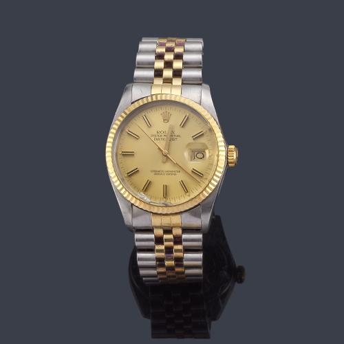  ROLEX Oyster Perpetual DateJust ref. 16013 superlativa Chronometer Officially Certified Date para caballero en acero y oro de 18 K.