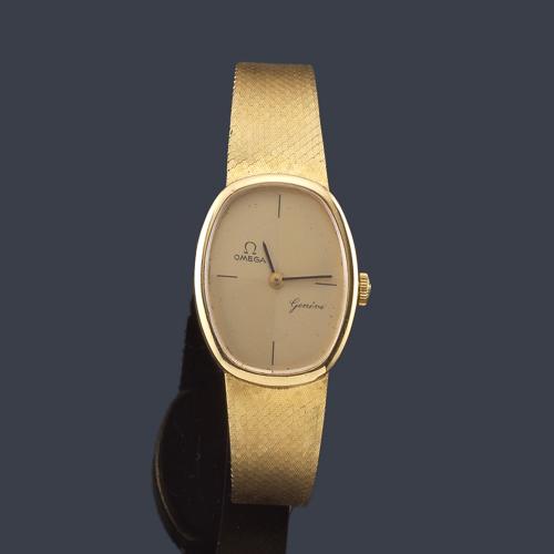  OMEGA de señora con caja y brazalete en oro amarillo de 18 K.