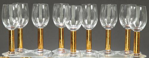 Lote 1049
Once copas de cristal con vástago metálico