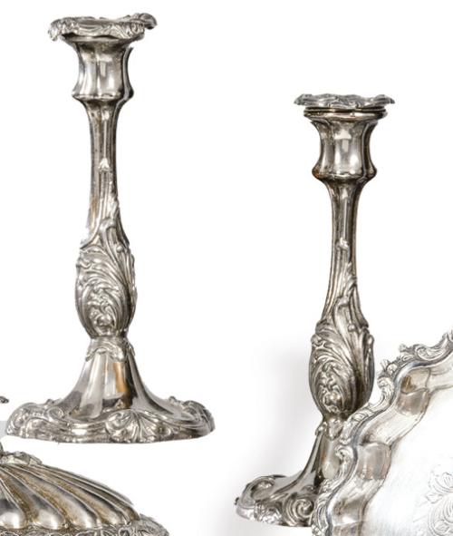  Pareja de candeleros de metal plateado S. XIX.