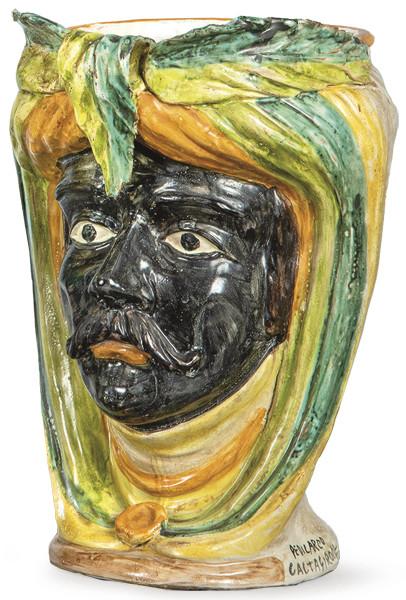  Jarrón de cerámica italiana de Caltagirone representando una cabeza de moro. Firmado en la base Siglo XX.