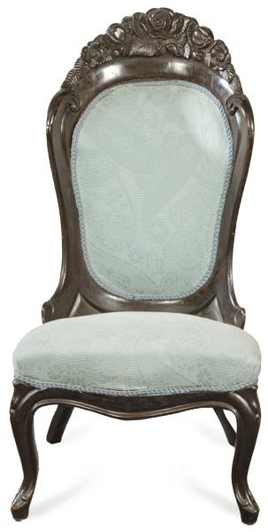  Butaca victoriana en madera tallada y ebonizada con tapicería de época posterior. Inglaterra, segunda mitad S. XIX