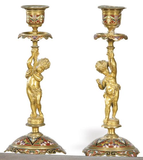  Pareja de candeleros de bronce con esmalte champlevé, Francia S. XIX.