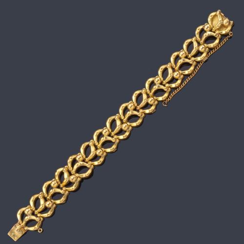 Lote 2123
Pulsera retro años '40 en montura de oro amarillo de 18K.