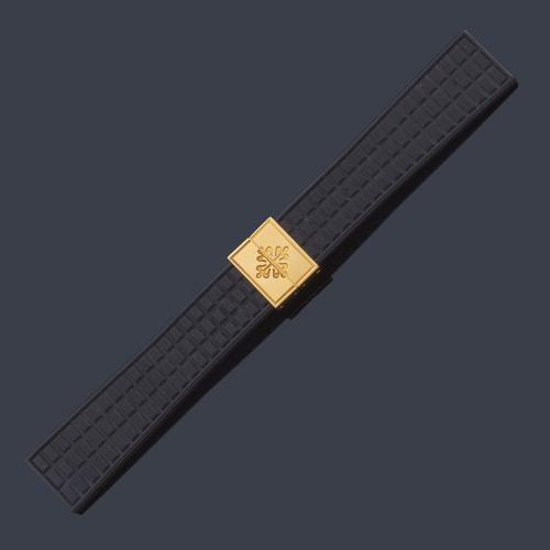  Pulsera Patek Philippe en caucho y oro amarillo de 18 K con cierre desplegable modelo Aquanaut.