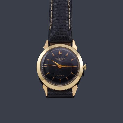  ULYSSE NARDIN de caballero con caja en oro de 14 K.