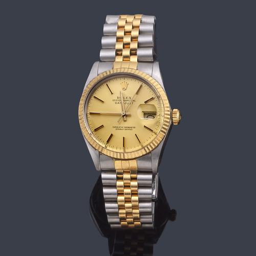  ROLEX Oyster Perpetual DateJust ref. 16013 superlativa Chronometer Officially Certified Date para caballero en acero y oro de 18 K. Con estuche.