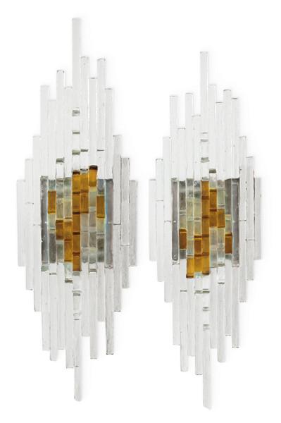 Lote 1314
Pareja de apliques de vidrio incoloro y ambar de Poliarte.
Italia, años 70