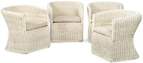  Conjunto de cuatro butacas de ratán trenzado, con asientos tapizados.
S. XX