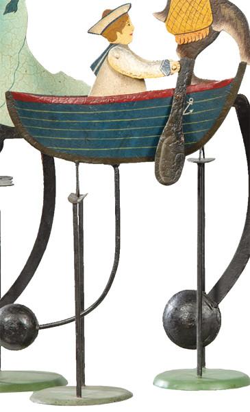  Tentetieso de hierro pintado "Marinero Remando".