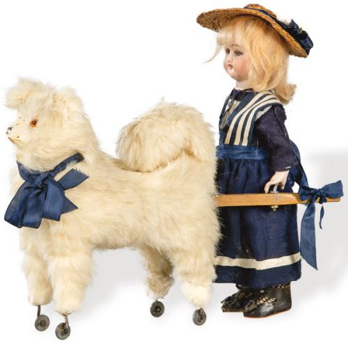  Autómata de Simon y Halbig "Niña con Perro" pp. S. XX
Muñeca de porcelana con ojos de cristal firmada, numerada y con marca "DEP"